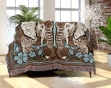 Lim Elephant Cotton Blend Blanket Throw in Beige, Blue and Off-White, on a bed