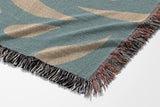 Nami Abstract Floral Blanket Throw in Blue and Beige, side view