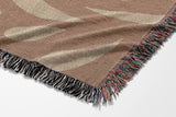 Nami Abstract Floral Blanket Throw in Rust and Beige, side view