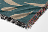 Nami Abstract Floral Blanket Throw in Teal and Beige, side view