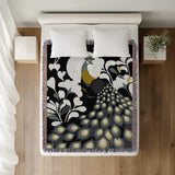 Nivo Peacock Cotton Blend Blanket Throw in Black, on a bed