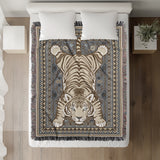 Roy Tiger Cotton Blend Blanket Throw in Gray, on a bed