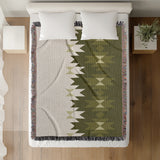 Shako Southwestern Cotton Blend Blanket Throw in Chartreuse and Off-White, on a bed