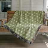 Stella Cotton Blend Blanket Throw in Mint and Off-White, draped over a chair