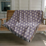 Stella Cotton Blend Blanket Throw in Periwinkle and Off-White, draped over a chair