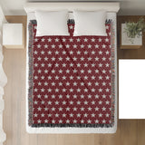 Stella Cotton Blend Blanket Throw in Red and Off-White, on a bed