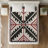 Tala Southwestern Cotton Blend Blanket Throw in Red, Black and Off-White, on a bed
