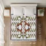 Tuk Leopard Cotton Blend Blanket Throw in Green, Burnt Orange and Off-White, laid flat