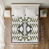 Tuk Leopard Cotton Blend Blanket Throw in Black, Green and Off-White, laid flat
