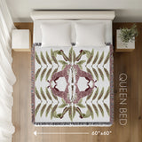 Tuk Leopard Cotton Blend Blanket Throw in Pink, Green and Off-White, laid flat