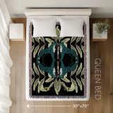 Tuk Leopard Cotton Blend Blanket Throw in Black, Teal and Green, laid flat