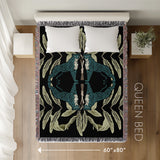 Tuk Leopard Cotton Blend Blanket Throw in Black, Teal and Green, laid flat