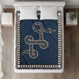 Vanjo Snake Cotton Blend Blanket Throw in Blue, Black and Off-White, on a bed