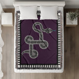Vanjo Snake Cotton Blend Blanket Throw in Purple, Black and Off-White, on a bed