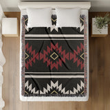 Wapi Southwestern Cotton Blend Blanket Throw in Red, Black and Off-White, on a bed