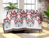 Xavier Zebra Cotton Blend Blanket Throw in Black, Pink and Off-White, draped over a chair