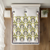 Xavier Zebra Cotton Blend Blanket Throw in Black, Chartreuse and Off-White, on a bed