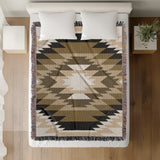 Zio Southwestern Cotton Blend Blanket Throw in Brown, Off-White and Dull Gold, on a bed